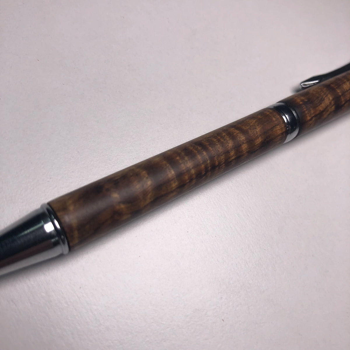 Twist Action Pen (Figured Tamboti) by Owen Louw