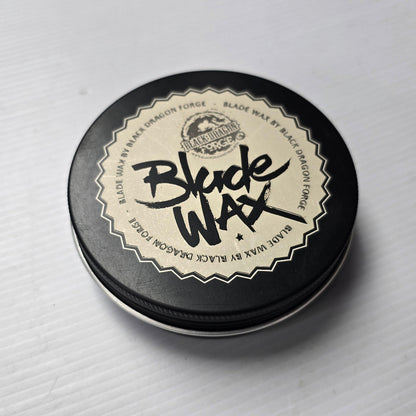Tin of Blonde Wax on a gray background