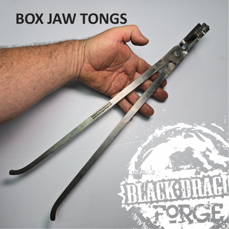 Hand holding box jaw tongs with 'Black Dragon Forge' branding on a gray background