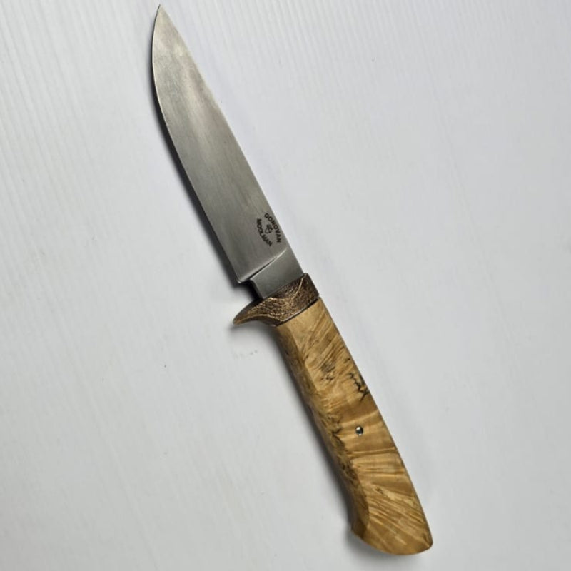 Knife with wooden handle on a white background