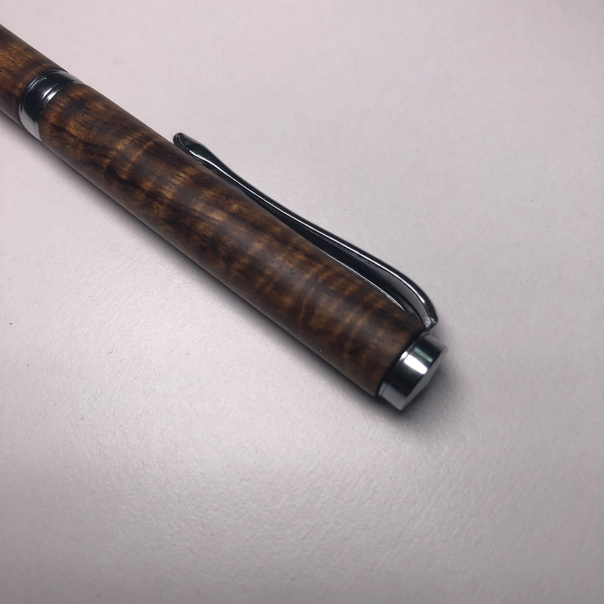 Twist Action Pen (Figured Tamboti) by Owen Louw