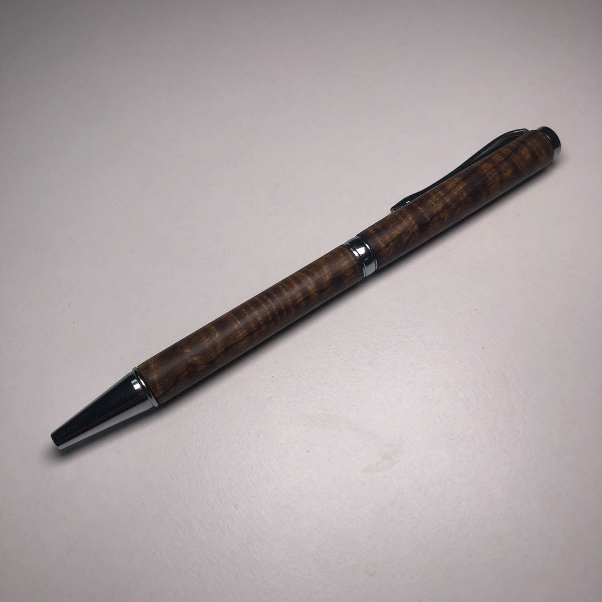 Twist Action Pen (Figured Tamboti) by Owen Louw