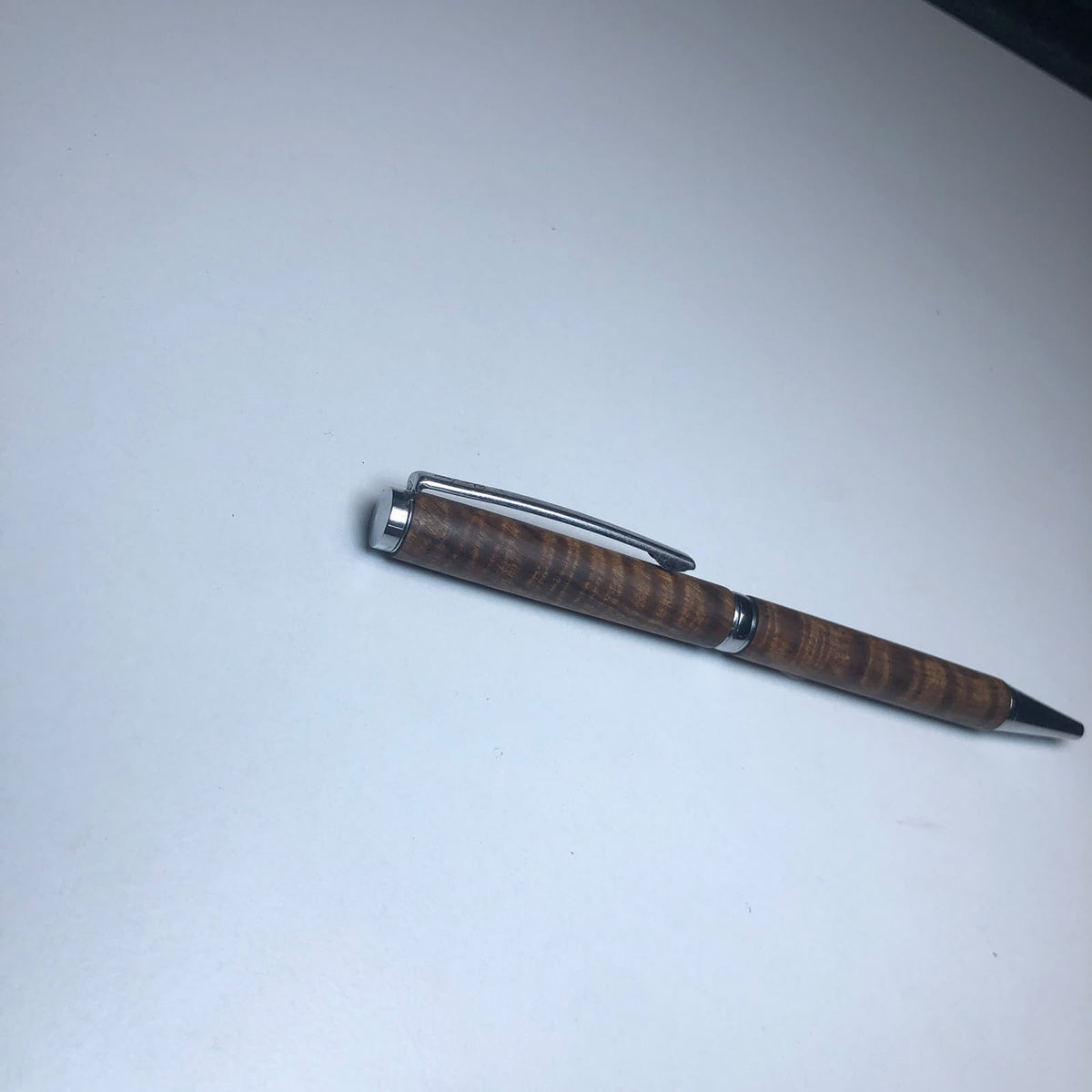 Twist Action Pen (Figured Tamboti) by Owen Louw