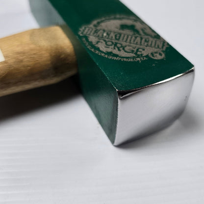 Hammer with wooden handle and metal head on a white background, featuring 'Jenvey Forge' branding.